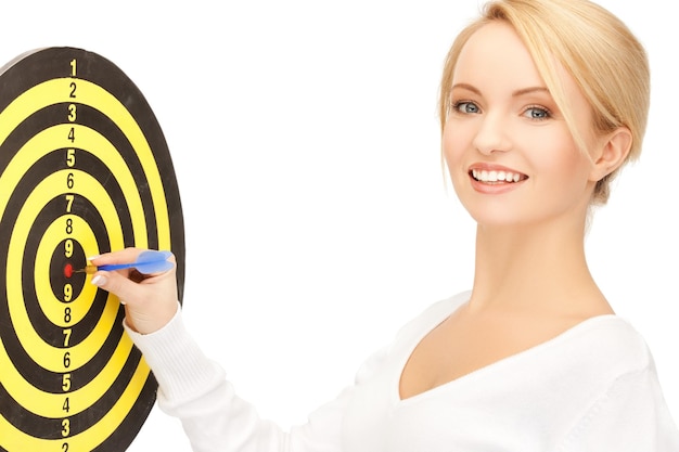 bright picture of businesswoman with dart and target....