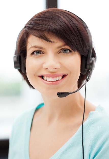 bright picture of friendly female helpline operator