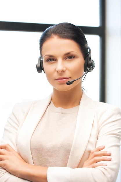 bright picture of friendly female helpline operator