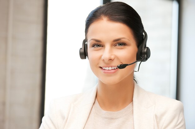 bright picture of friendly female helpline operator