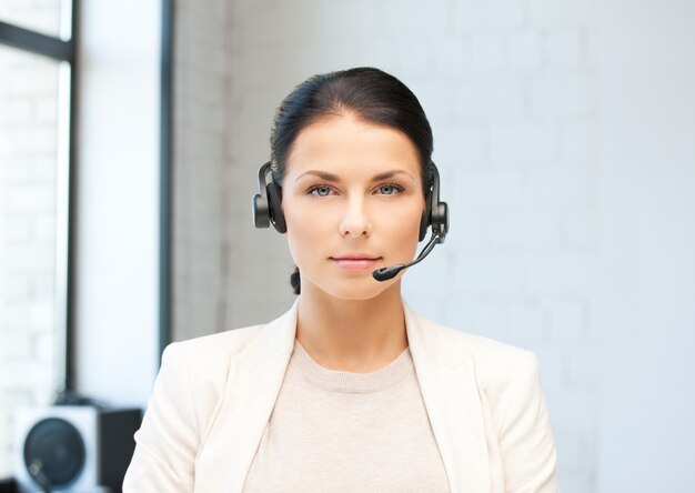 bright picture of friendly female helpline operator