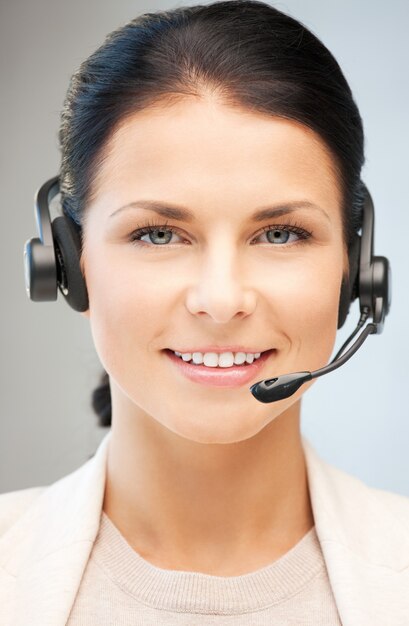 bright picture of friendly female helpline operator