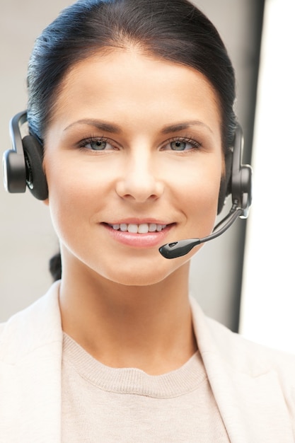 bright picture of friendly female helpline operator