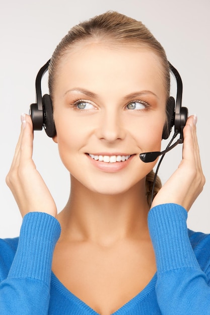 bright picture of friendly female helpline operator