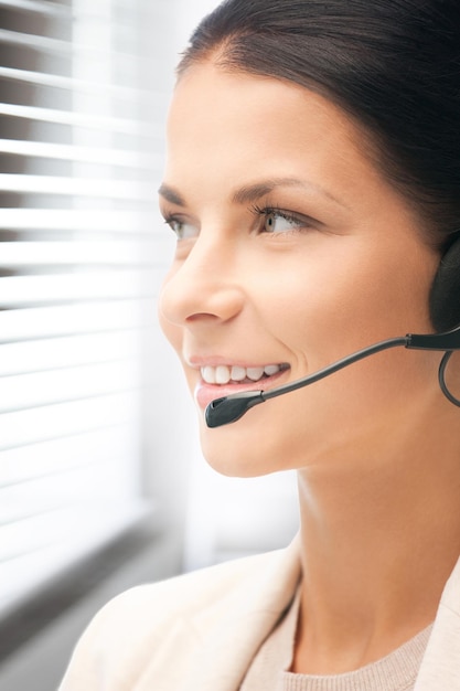 bright picture of friendly female helpline operator