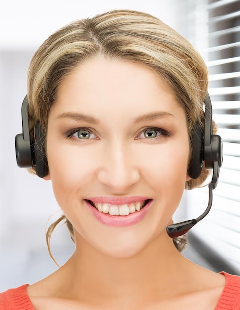 bright picture of friendly female helpline operator