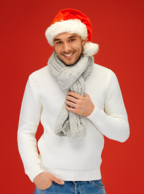 bright picture of handsome man in christmas hat.