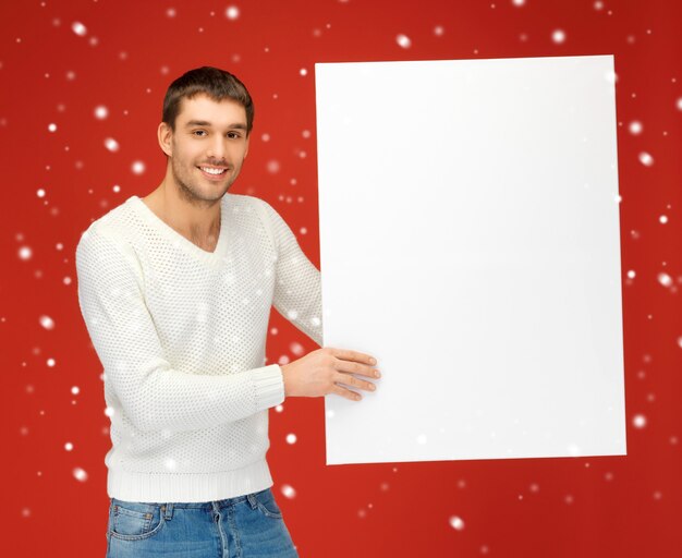 bright picture of handsome man with big blank board.