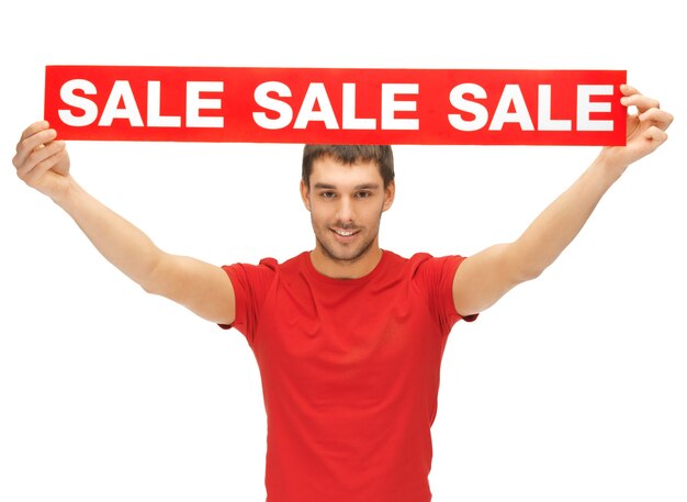 bright picture of handsome man with sale sign.