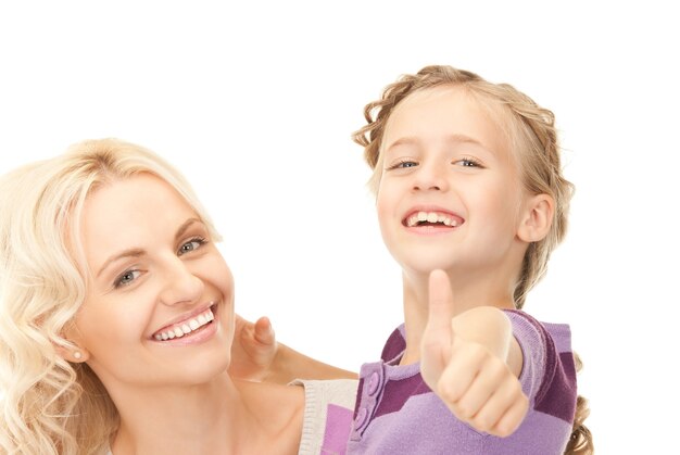 bright picture of happy mother and child (focus on girl)