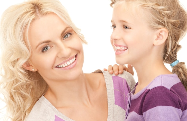 bright picture of happy mother and child (focus on woman)