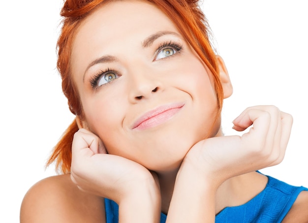 bright picture of happy smiling woman dreaming