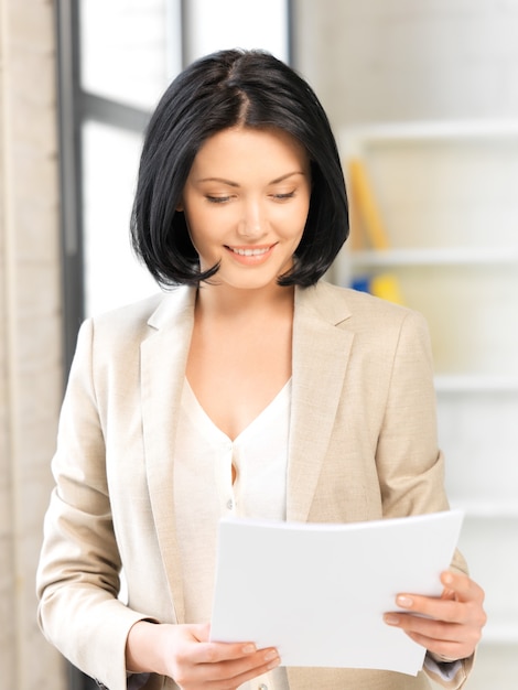 bright picture of happy woman with documents