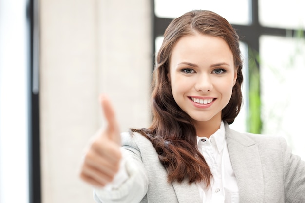 bright picture of lovely teenage girl with thumbs up