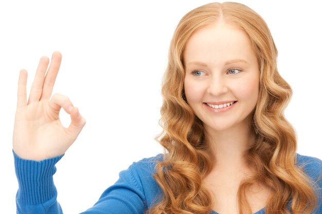 bright picture of lovely woman showing ok sign