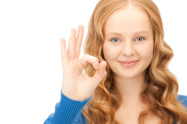 bright picture of lovely woman showing ok sign