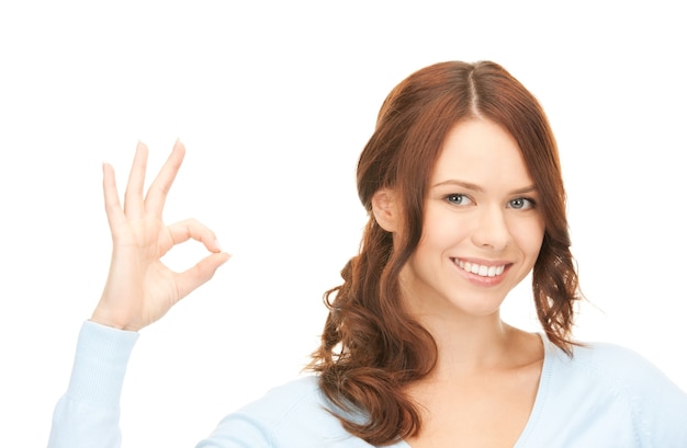 bright picture of lovely woman showing ok sign