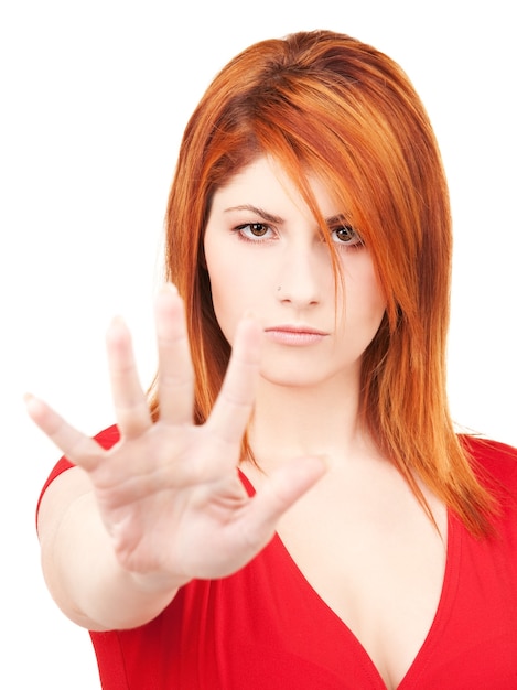 bright picture of lovely woman showing stop sign