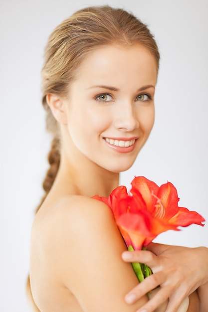 bright picture of lovely woman with lily flower.