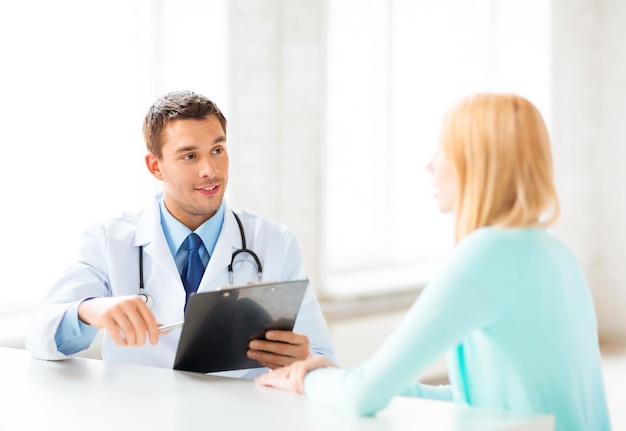 bright picture of male doctor with patient