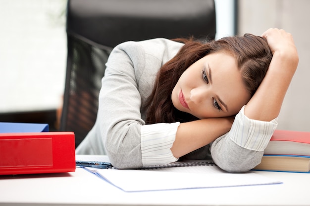 bright picture of sleeping woman with book