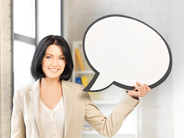 bright picture of smiling businesswoman with blank text bubble