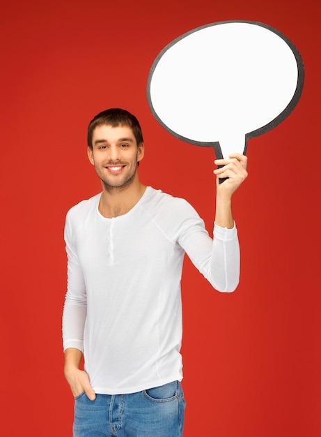 bright picture of smiling man with blank text bubble.