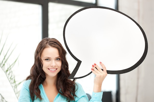 bright picture of smiling woman with blank text bubble