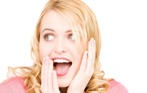 Photo bright picture of surprised woman face over white