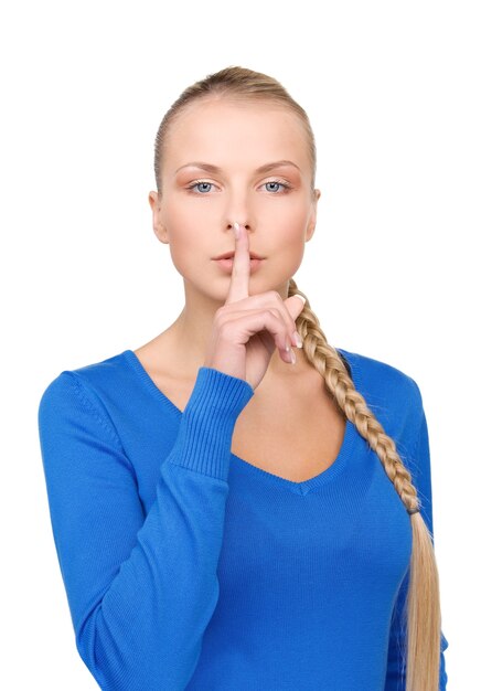 bright picture of teenage girl with finger on lips