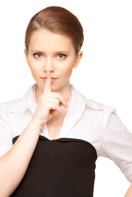 bright picture of teenage girl with finger on lips