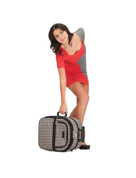 bright picture of unhappy woman with heavy suitcase