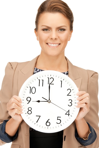 bright picture of woman holding big clock