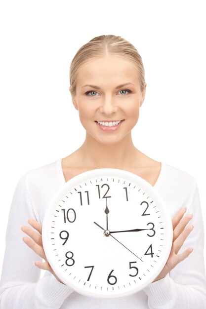 bright picture of woman holding big clock