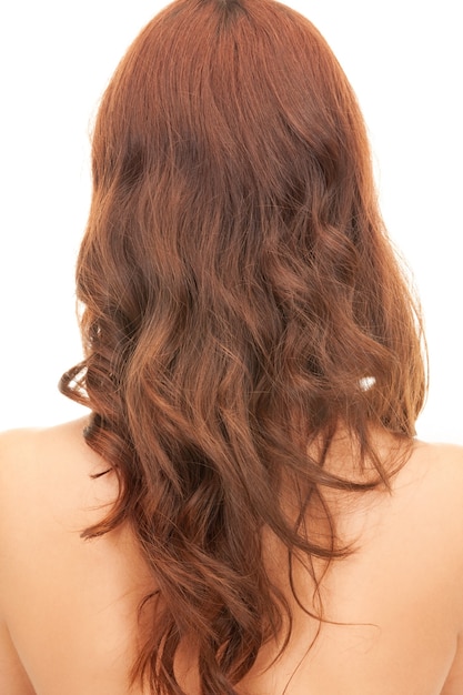 bright picture of woman with long hair from the back