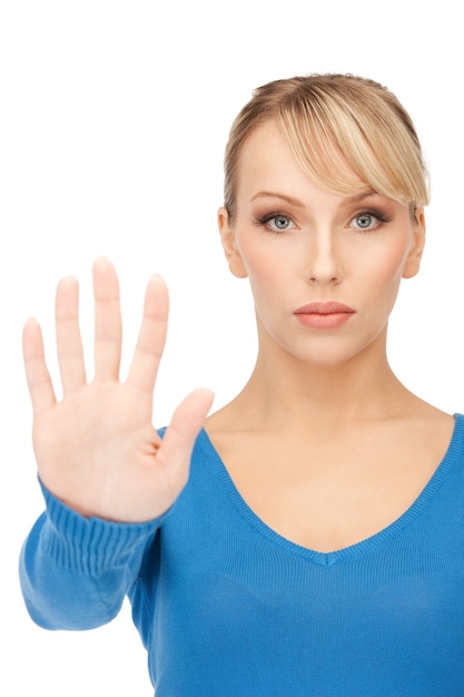 bright picture of young woman making stop gesture