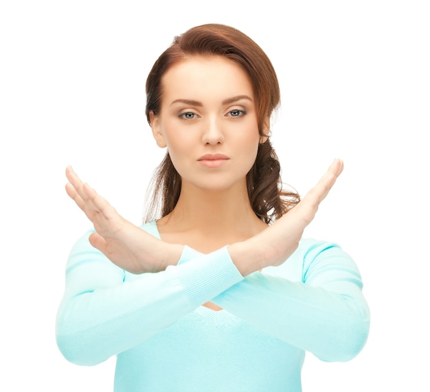 bright picture of young woman making stop gesture