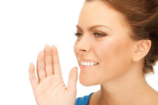 bright picture of young woman whispering gossip