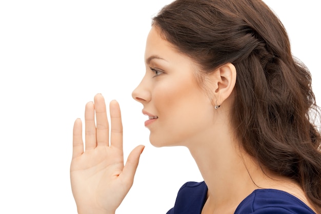 bright picture of young woman whispering gossip