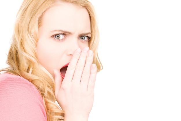 bright picture of young woman whispering gossip