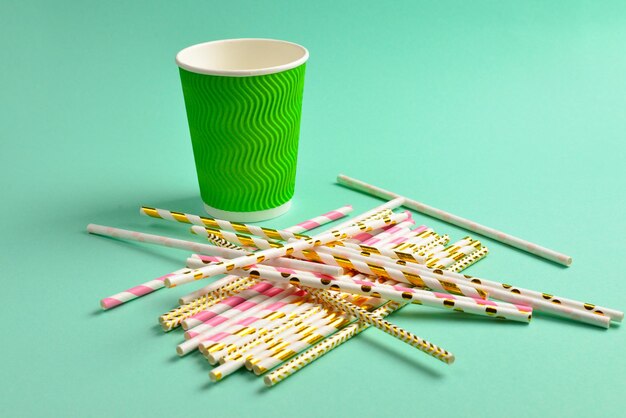 Bright pink and golden tubules and paper cups