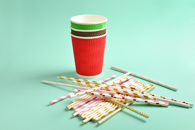 Bright pink and golden tubules and paper cups.