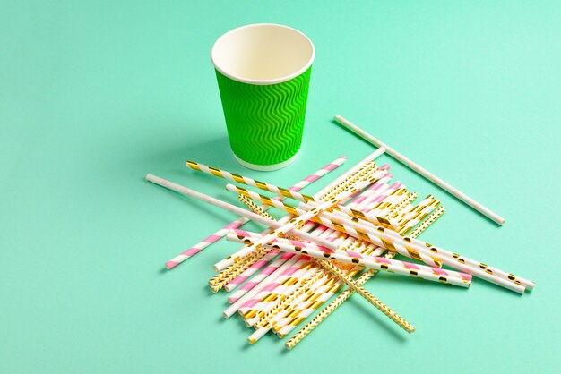 Bright pink and golden tubules and paper cups.