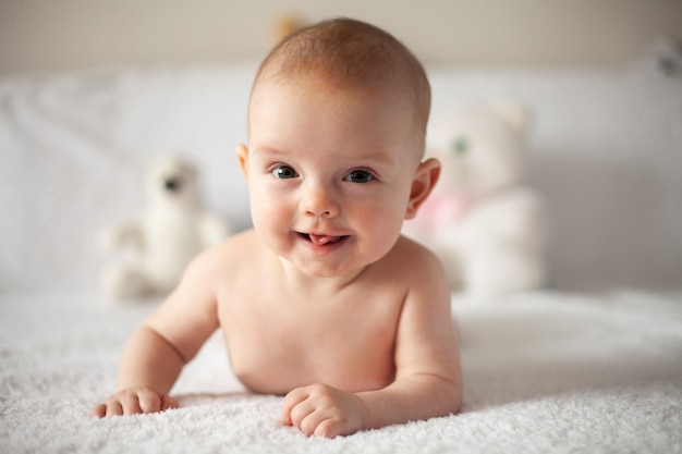 Bright portrait of adorable baby - parenting or love concept.