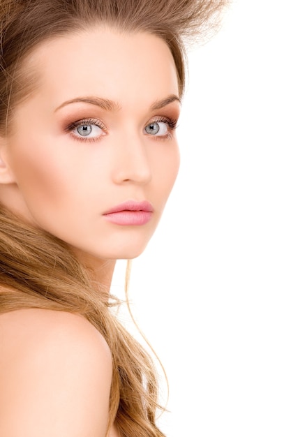 bright portrait of lovely woman over white wall