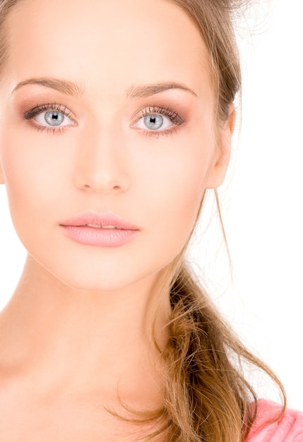 bright Portrait of lovely woman over white wall