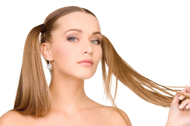 bright Portrait of lovely woman over white wall