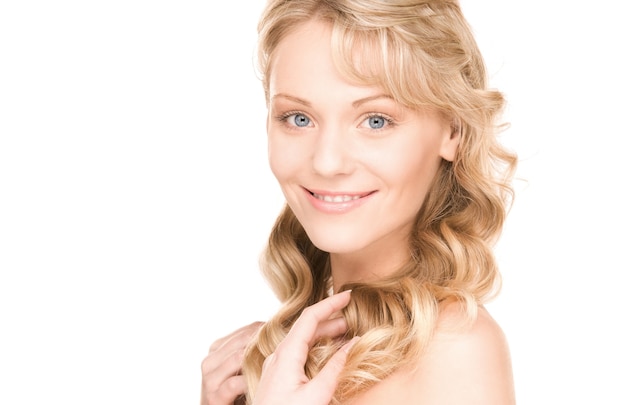 bright Portrait of lovely woman over white wall