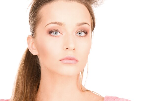 bright Portrait of lovely woman over white wall