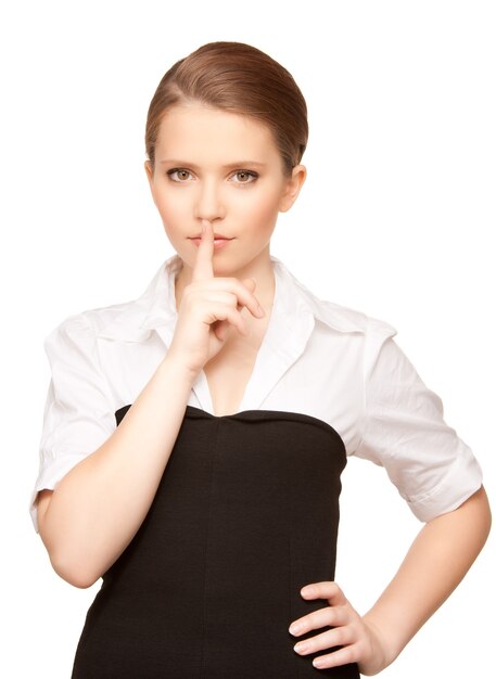 bright Portrait of teenage girl with finger on lips